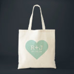Gastgeschenk Hochzeit Tragetasche<br><div class="desc">Niedliche mädchenhafte,  moderne Herzform mit den personalisierten Monogramm-Initialen der Braut und des Bräutigams und dem individuellen Hochzeitstermin. Ideal für Gastgeschenk Hochzeit Totbeutel,  Valentinstag,  Jubiläumsgeschenk oder jede Gelegenheit! Klicken Sie auf die Schaltfläche "Anpassen",  um Ihren eigenen Text hinzuzufügen und Schriftart und Farben für ein personalisiertes Design zu ändern.</div>