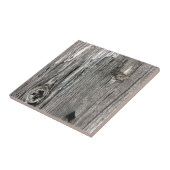 Gealterte hölzerne Zaunaufgabe von der rustikalen Fliese (Seite)