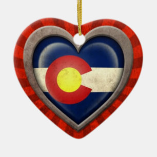 Gealtertes Colorado-Flaggen-Herz mit hellen Keramikornament