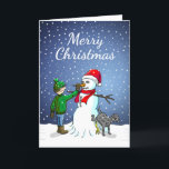 Gebäude a Snowman Feiertagskarte<br><div class="desc">Der Junge hat einen Schneemann gebaut,  auf dem sein Hund steht und uriniert,  während der Junge dem Schneemann eine Karottennaase gibt.</div>