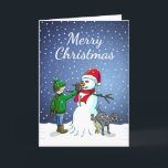 Gebäude a Snowman Feiertagskarte<br><div class="desc">Der Junge hat einen Schneemann gebaut,  auf dem sein Hund steht und uriniert,  während der Junge dem Schneemann eine Karottennaase gibt.</div>