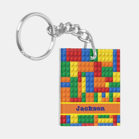 Gebäude aus farbigen Steinen Personalisiert Schlüsselanhänger (Vorderseite links)