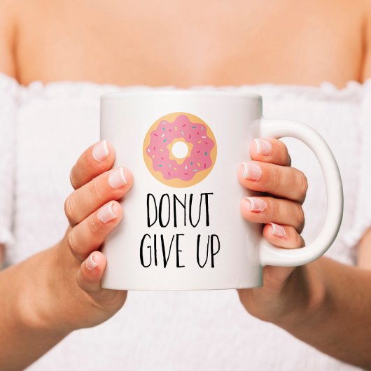 Geben Sie auf Kaffeetasse