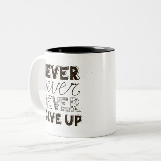 Geben Sie nie auf Zweifarbige Tasse (Vorderseite Links)