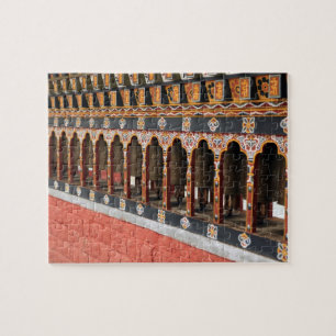 Gebetsmühlen auf dem zentralen Platz in Thimphu Puzzle