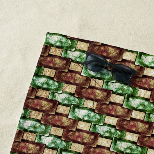 Gebogene und grün-braune rechteckige Stücke Strandtuch (Beispiel)