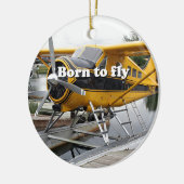 Geboren zu fliegen: Biberfloss-Flugzeug Keramikornament (Links)