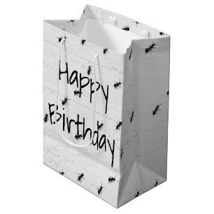 Geburtstag Schwarze Ameisen auf weiß getünchtem Ho Mittlere Geschenktüte