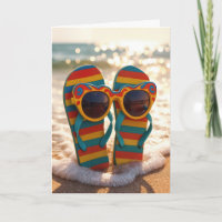 Geburtstags-Sonnenbrille auf Flip-Flops in der Bra