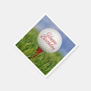 Geburtstagsgolfball mit rotem Tee Serviette