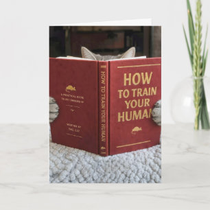 Geburtstagskatze liest ein Buch über das Training Karte