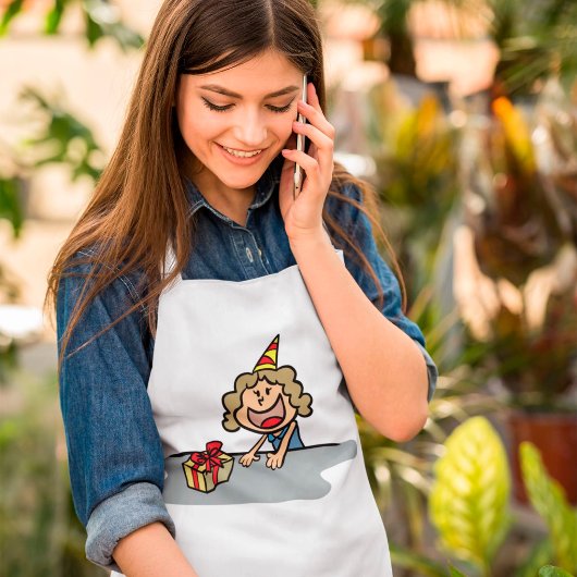 Geburtstagskind mit Geschenk Schürze