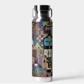 Gedämpfte erdige Folk-Art-Patchworkdecke Trinkflasche (Vorne)
