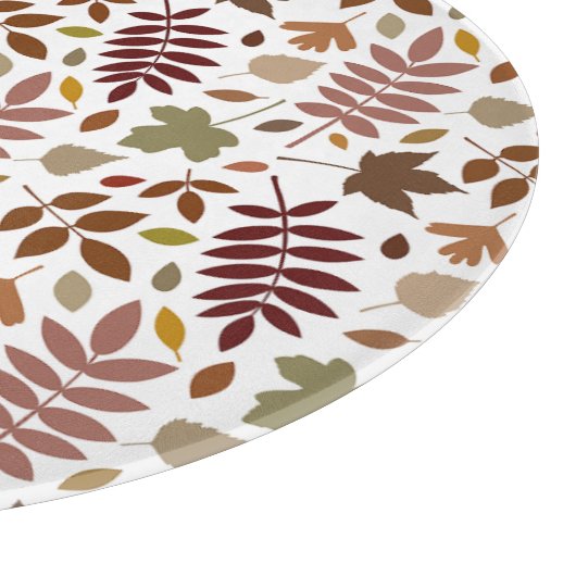 Gefallene Blätter Muster-Herbstfarben auf Weiß Schneidebrett (Ecke)