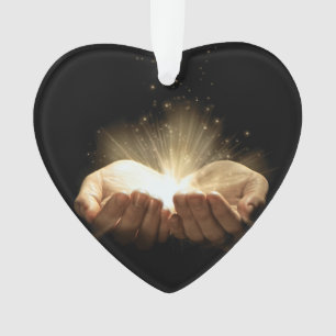 Gefaltete Hände, die Licht halten Ornament