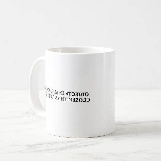 GEGENSTÄNDE IM SPIEGEL KÖNNEN NAHER SEIN ....... KAFFEETASSE (Vorderseite Links)
