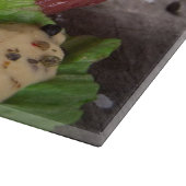 Gegrillte Grillensteaks mit frischen Kräutern und Schneidebrett (Ecke)