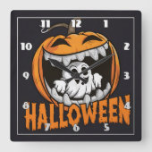 Geist, der aus einem riesigen Halloween-Kürbis her Quadratische Wanduhr (Vorderseite)
