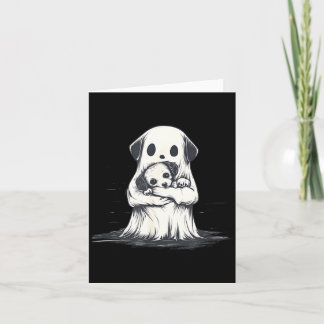 Geist hält lustiges Halloween-Kostüm mit Welpen Karte