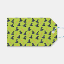 Gekickte, gut rosa und grüne Hexe auf/von Geschenk