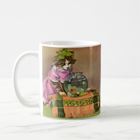 gekleidete Katze und Fischschale Kaffeetasse (Links)