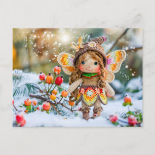 Gekreuzte Puppe mit Schnee und Rosehienen Feiertagspostkarte