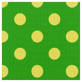 Gelb auf grünem Polka-Punkte-Musterdesign Stoff (Nahaufnahme)