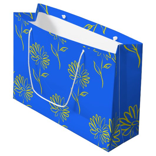 Gelbblütenmuster Große Geschenktüte (Vorderseite Schrägansicht)