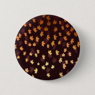 Gelbe Ahornschicht auf dunkelrot Button