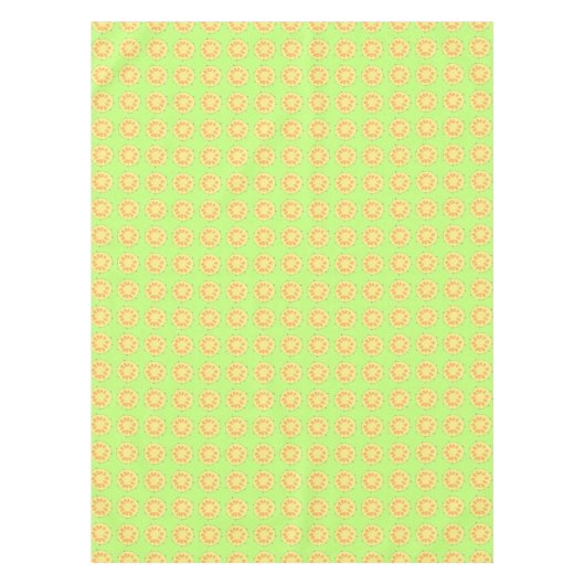 Gelbe Ananas in Scheiben auf grünen Tischdecken (Vorderseite)