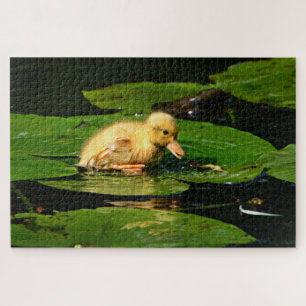 Gelbe Babyente auf Lily Pads schweben Puzzle