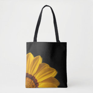 Gelbe Blume auf schwarzem Hintergrund Tasche