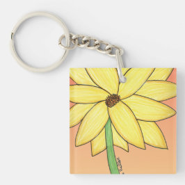 Gelbe Blume mit orangefarbenem Hintergrund Schlüsselanhänger