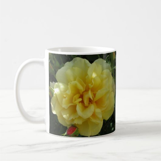 Gelbe Blumen-Kaffee-Tasse Kaffeetasse (Links)
