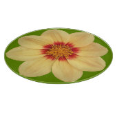 Gelbe Dahlia auf grüner Flora Schneidebrett (Ecke)