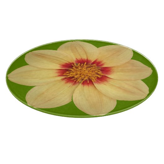 Gelbe Dahlia auf grüner Flora Schneidebrett (Ecke)