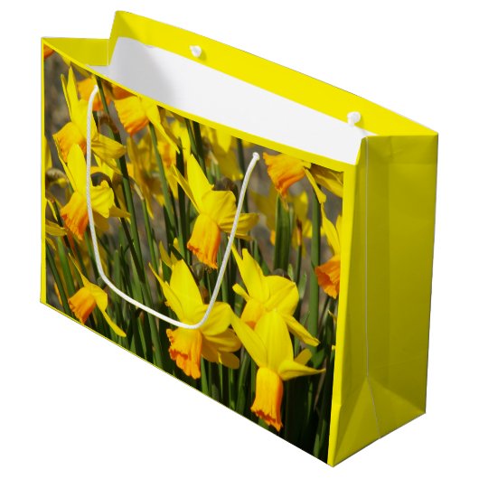 Gelbe Frühlingsdüster Große Geschenktüte (Vorderseite Schrägansicht)