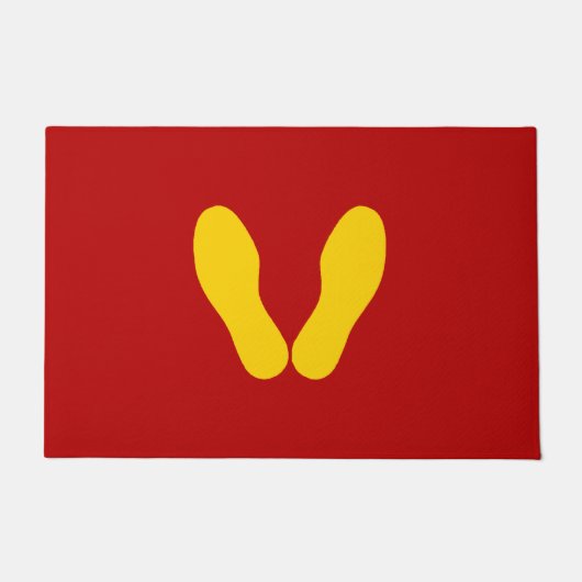 GELBE FUSSDRUCKEN AUF ROT FUßMATTE (Vorderseite)