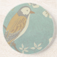 Gelbe, graue und beige Vögel auf einem Zweig