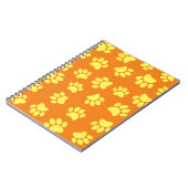 Gelbe Hundeschraube druckt überall in orangefarben Notizblock (Linke Seite)