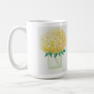 Gelbe Hydrangeas in einer Vase Kaffeetasse