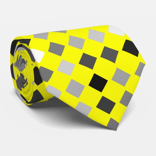Gelbe Krawatte mit den schwarzen, grauen und (Gerollt)