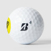 Gelbe Krone, schwarze Monogramm Golfball (Logo)