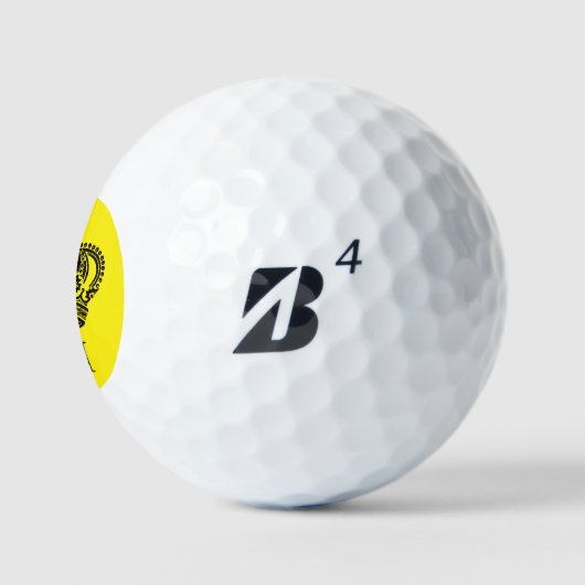 Gelbe Krone, schwarze Monogramm Golfball (Logo)