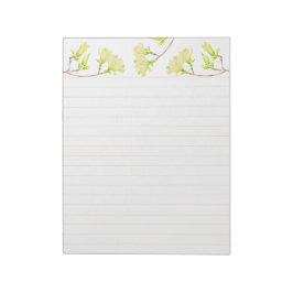 Gelbe Magnolien auf einem großen Notepad Notizblock
