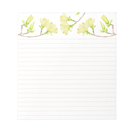 Gelbe Magnolien auf einem mittleren Editor Notizblock (Vorderseite)