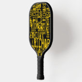Gelbe Namen über schwarz Pickleball Schläger (Links)