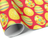 Gelbe Ostereier auf rot Geschenkpapier (Rolleneckpunkt)