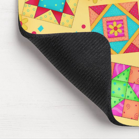 Gelbe Patchwork-Steppdecke blockiert Mousepad (Ecke)