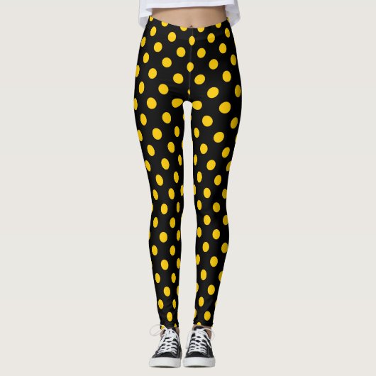 Gelbe Polka-Punkte mit schwarzem Hintergrund Leggings (Vorderseite)